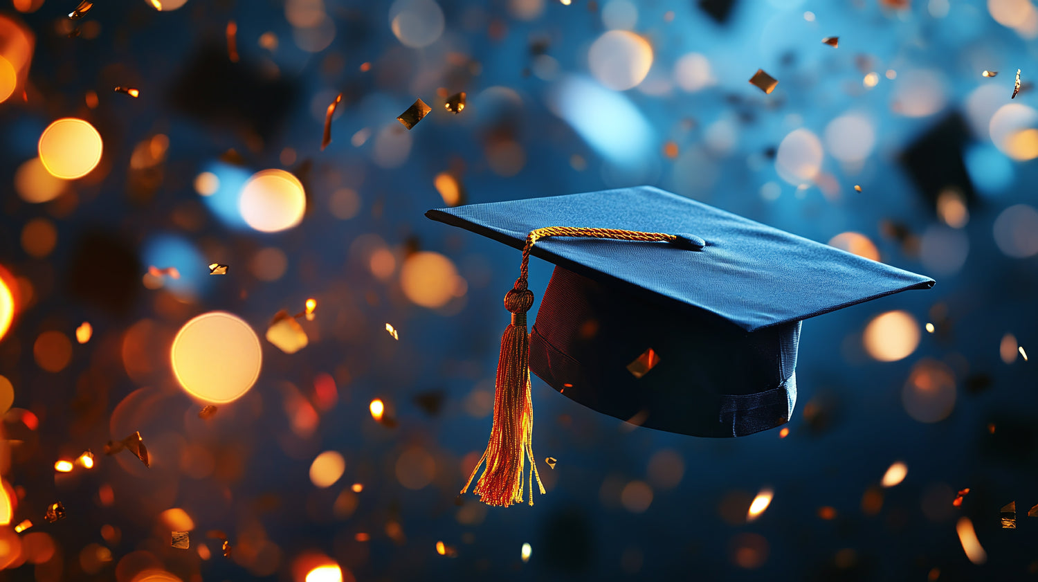 Blue/black background with a graduation cap in air as the central focus, confetti and boca flair details surround grad cap