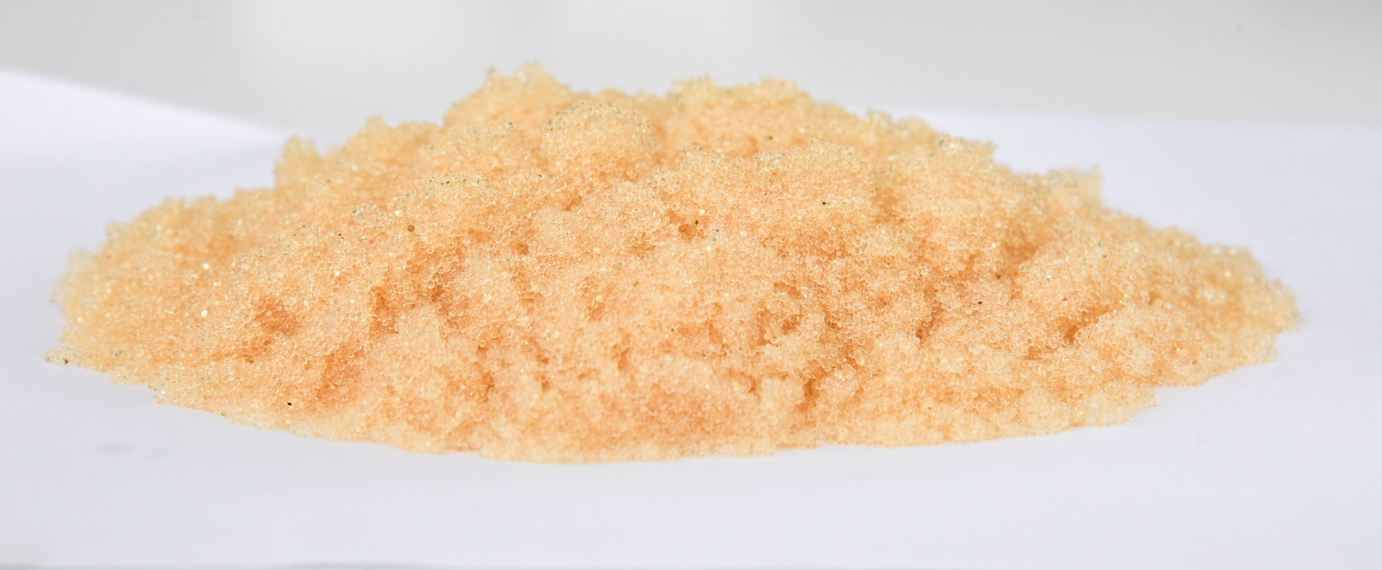 a closeup of water softener resin