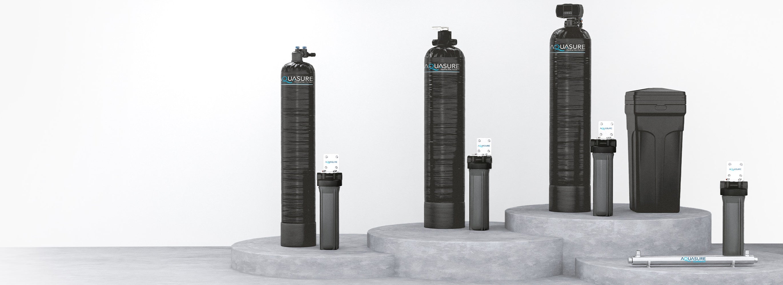 different aquasure systems and filters lined up including Aquasure Harmony Series, Aquasure Fortitude Pro, Fortitude V2 pre filters, and Aquasure Quantum uv water filter system